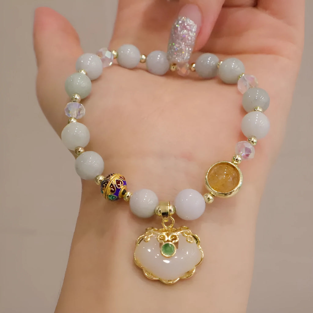 Gray jade and strawberry quartz women's bracelet with geometric ethnic metal decorations