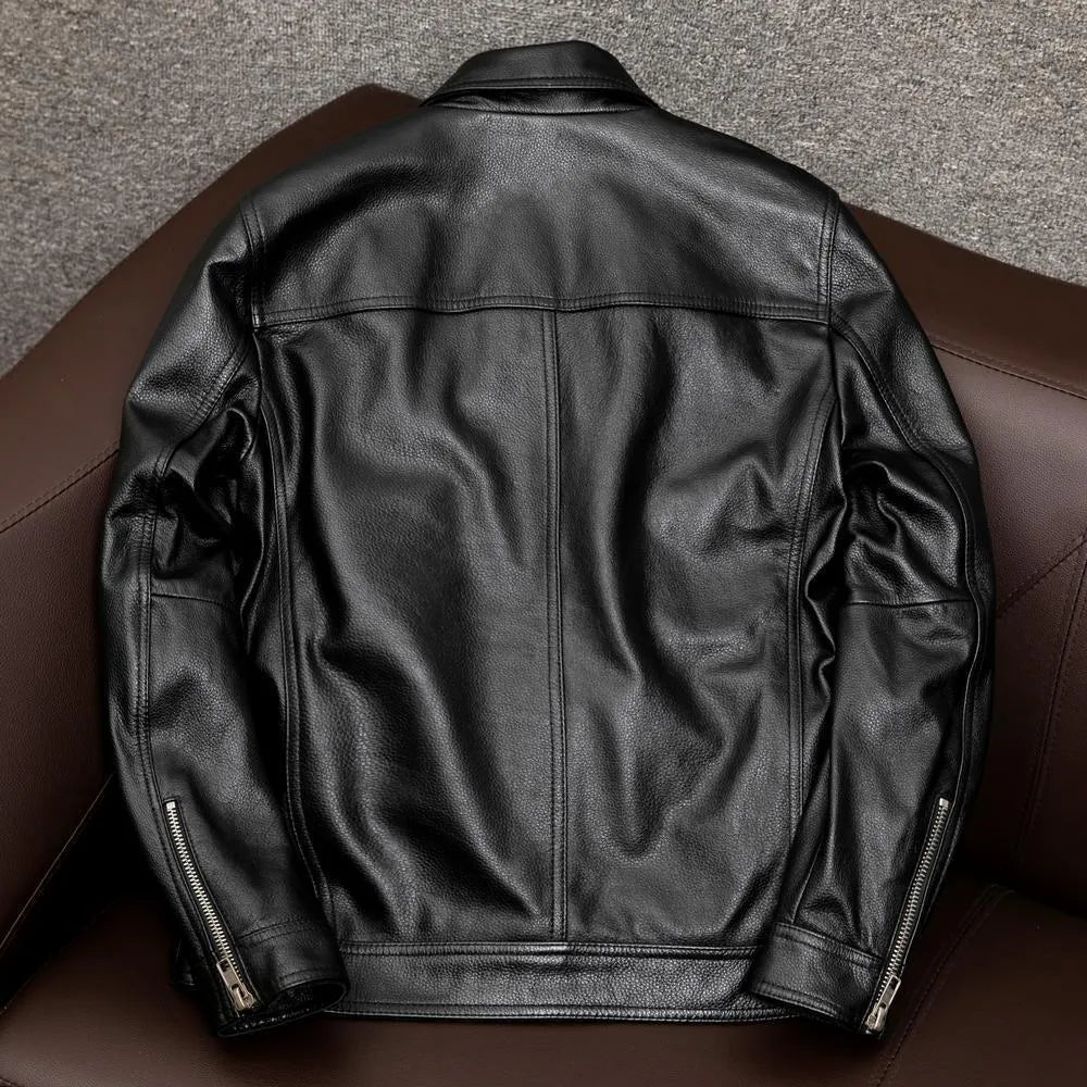 Men's black plus size PU leather jacket with lapel collar and side pockets on a hanger.