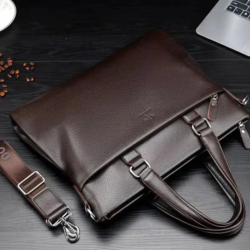 Black PU leather men's messenger bag with crossbody strap and splicing detail.