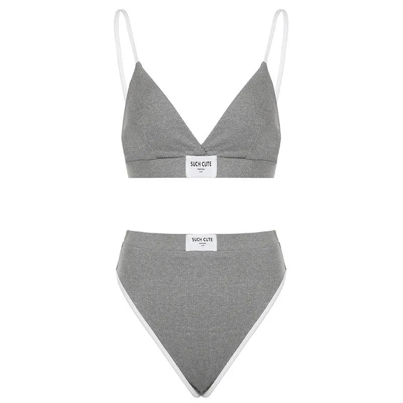 Women's bikini set with contrast binding and letter embroidery details, sleeveless design with shorts-length bottoms