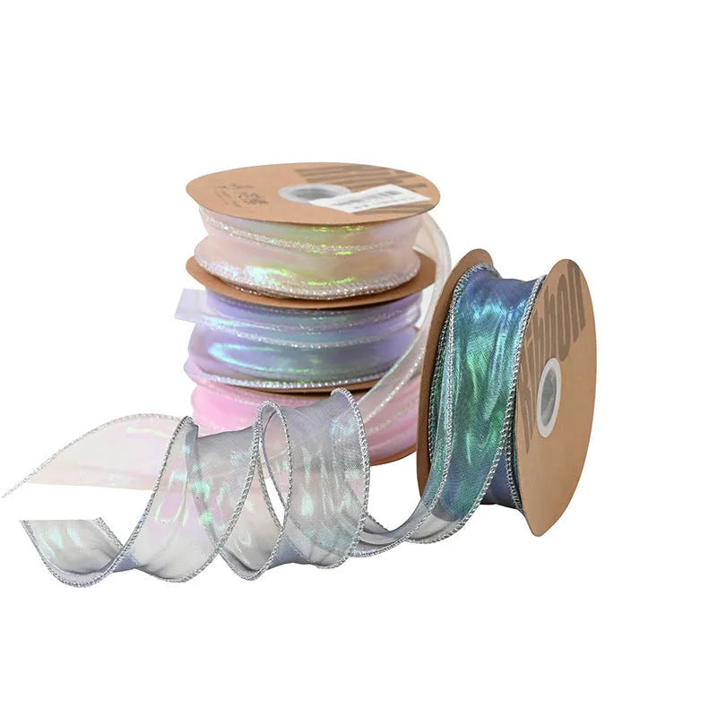 Roll of 4cm wide mesh fishtail yarn craft ribbon in various illusion colours.