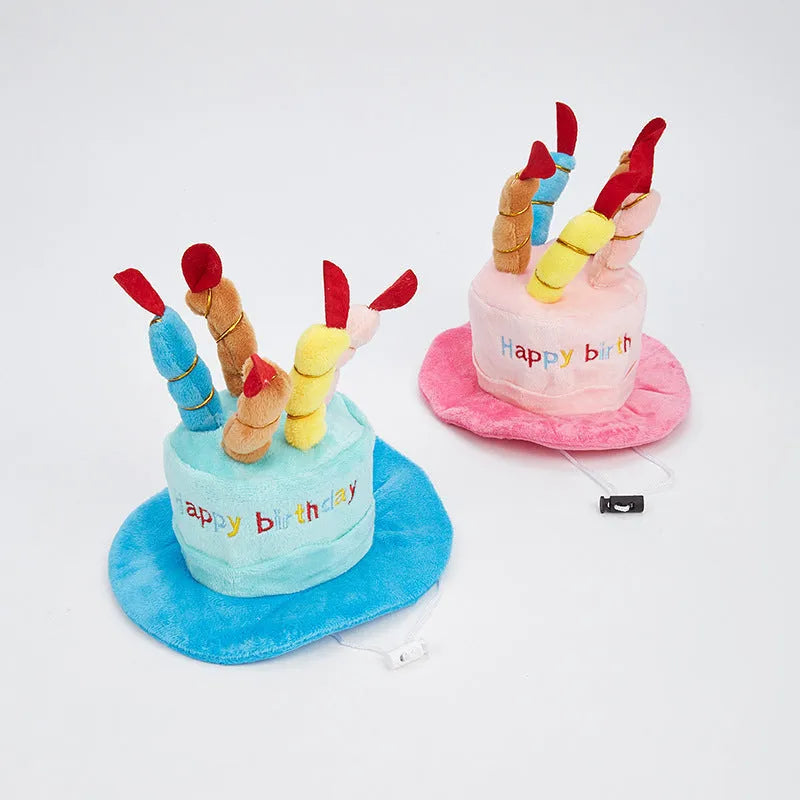 Blue dog birthday hat with elastic strap and decorative ball top for small dog.