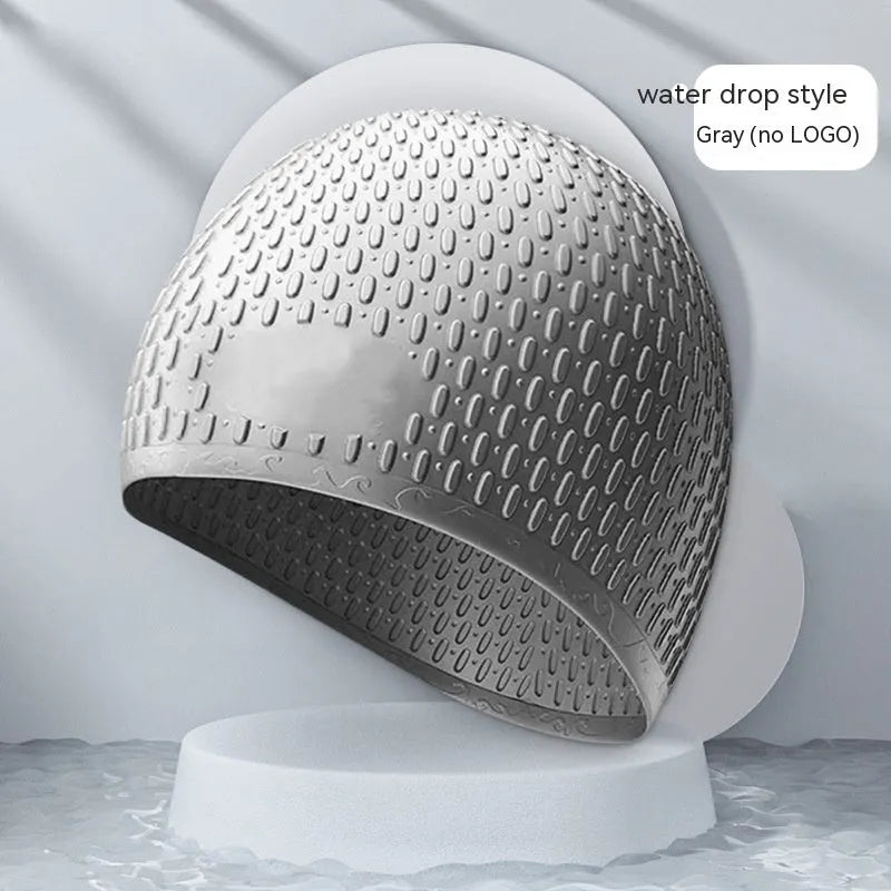 Silicone swimming cap with water drop design in nine solid colours for adult swimmers