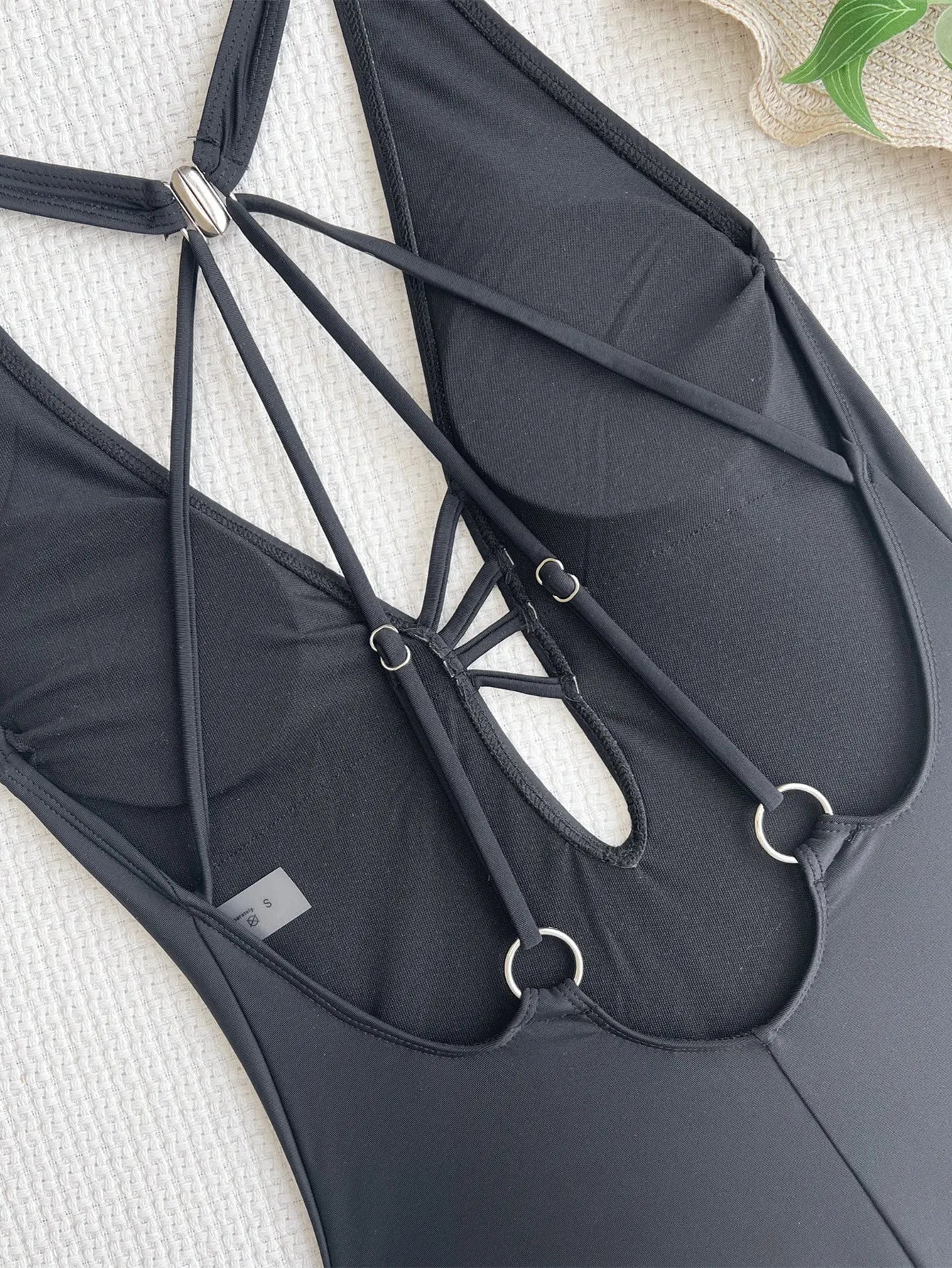 Women's solid black one-piece nylon bikini for swimming
