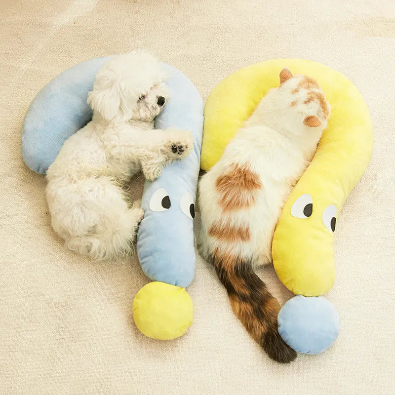 Blue and yellow rectangular pet sleeping pillow for cats and dogs on a white background.