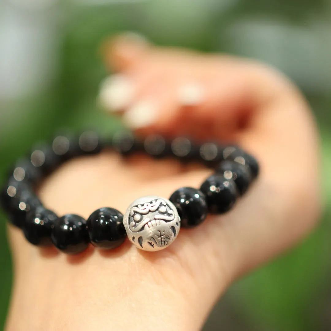 Women's black agate bracelet with 10mm beads and sterling silver in Chinese style design