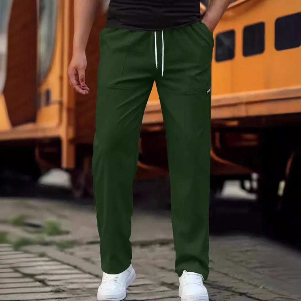 Men's polyester trousers for spring and autumn in various colours including light grey and dark green.