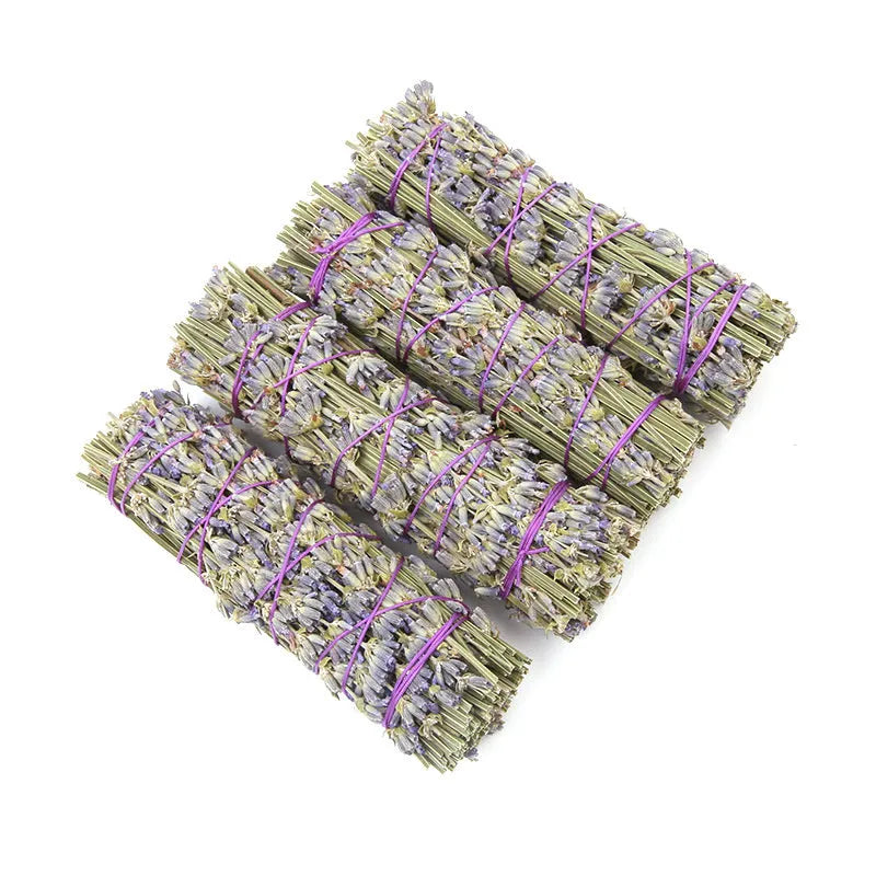 A single 4-inch long dried lavender aromatherapy stick on a plain background.