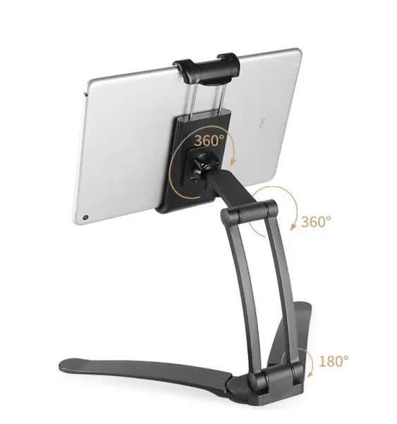 Silver aluminum alloy desktop stand holding a tablet, showing 360-degree adjustable arm and clamping mechanism.