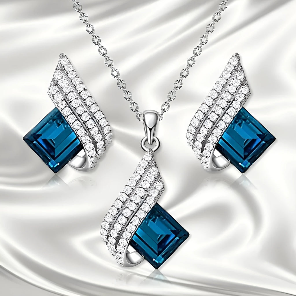 Women's necklace and earring set with a glass pendant on an electroplated alloy cross chain.