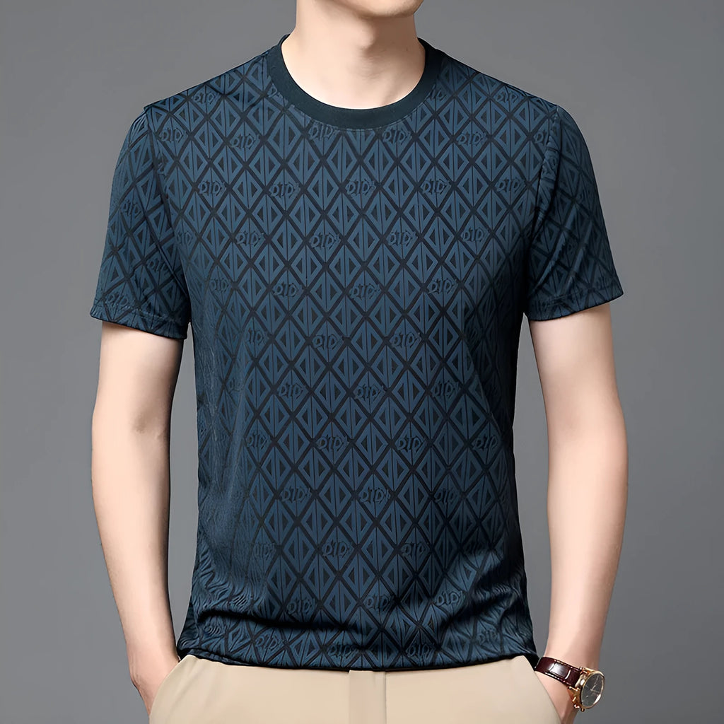 Man wearing a loose-fit ice silk jacquard short sleeve top in a solid colour.
