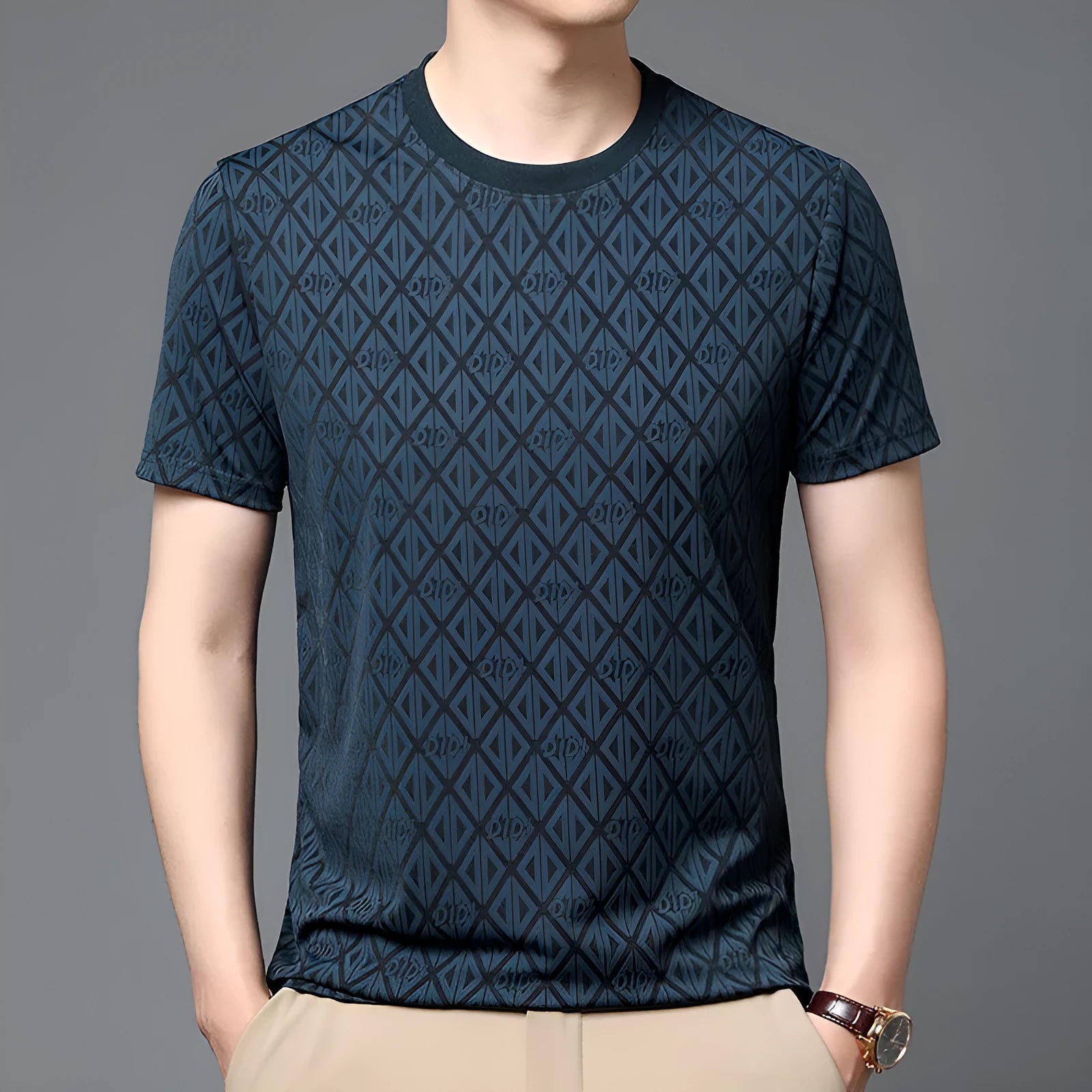 Man wearing a loose-fit ice silk jacquard short sleeve top in a solid colour.