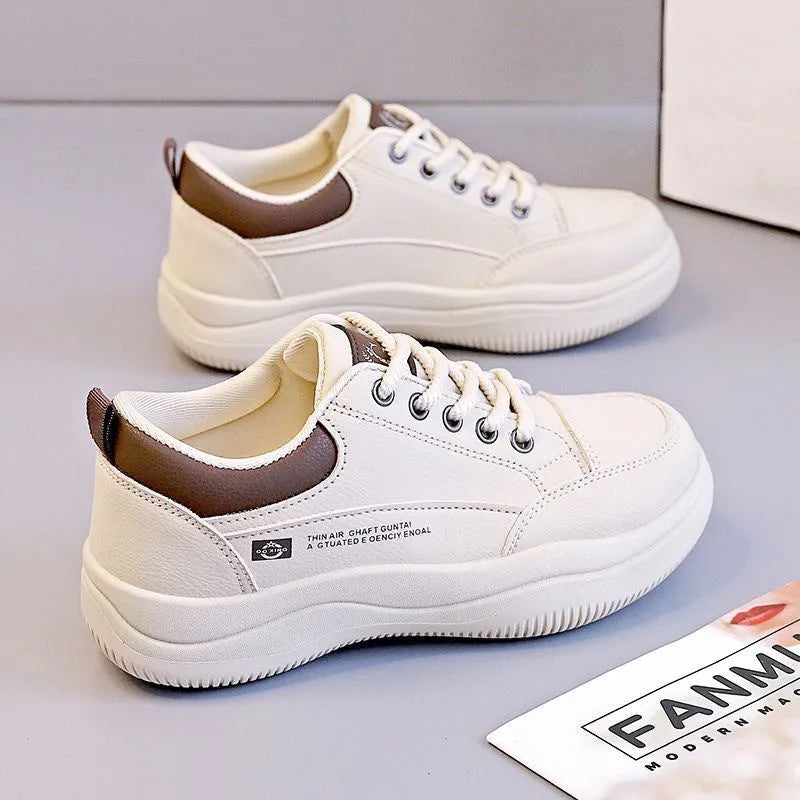 Women's white Korean-style lace-up shoes with cross-strap detailing and flat mid heel