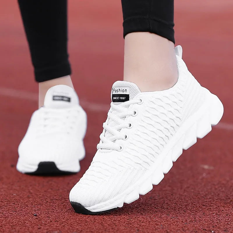 Women's running shoes with fly weaving upper in black, pink, or white colour options