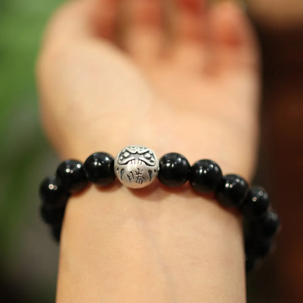 Women's black agate bracelet with 10mm beads and sterling silver in Chinese style design