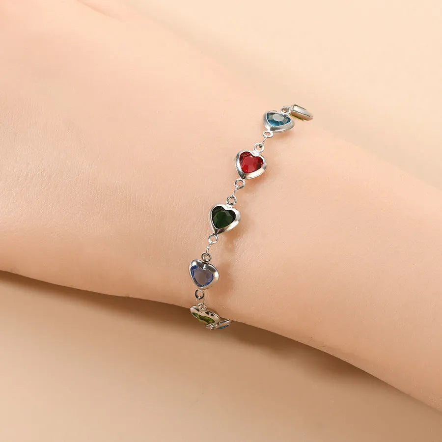 Geometric heart-shaped stainless steel bracelet with electroplated colourful finish on wrist