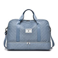 Portable buggy travel bag in Oxford cloth with 36-55L capacity shown in solid colour option