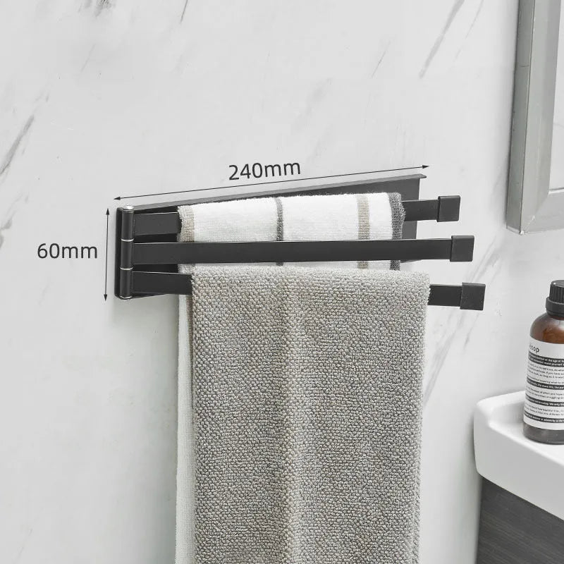Nordic style folding towel rack in black mounted on bathroom wall with towels