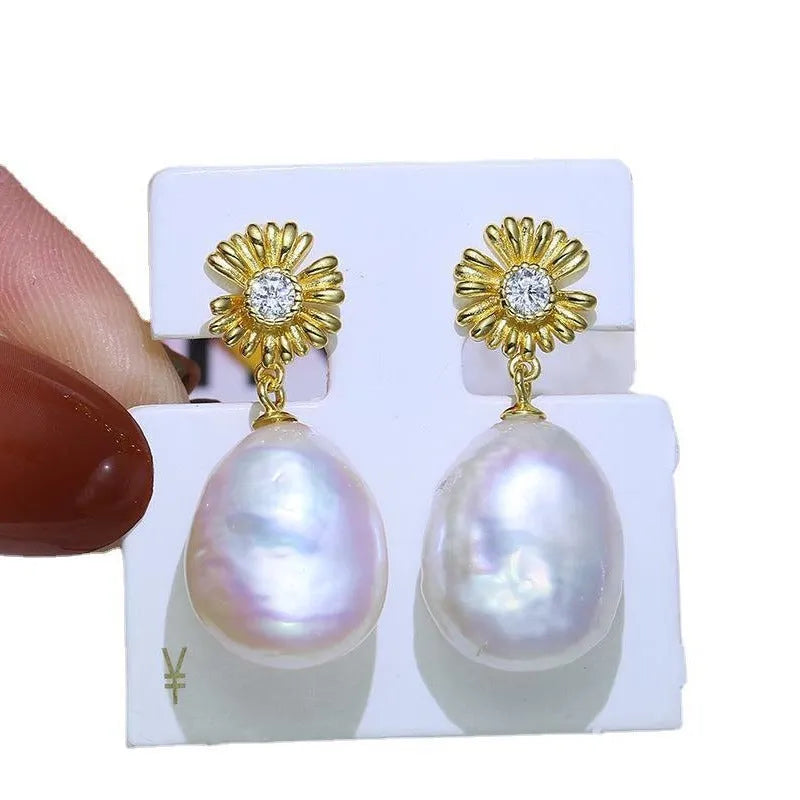 Baroque flower-shaped S925 sterling silver earring holder ring with a pair of drop earrings.