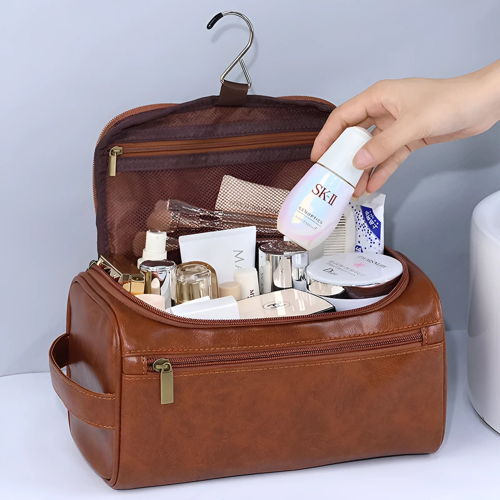 Large waterproof cosmetic bag in retro style, shown in PU leather brown and Oxford cloth navy blue options.