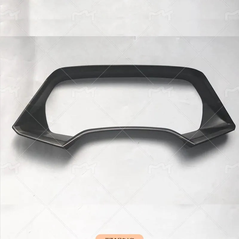 ABS plastic decorative dashboard frame for a BMW X5L in Carbon Fibre and Peach Wood finishes