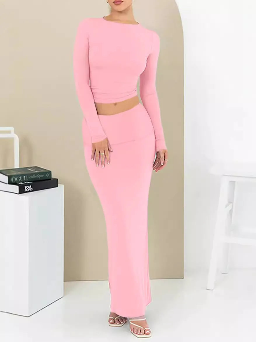 Women's black polyester two-piece suit with a top and long skirt for autumn.