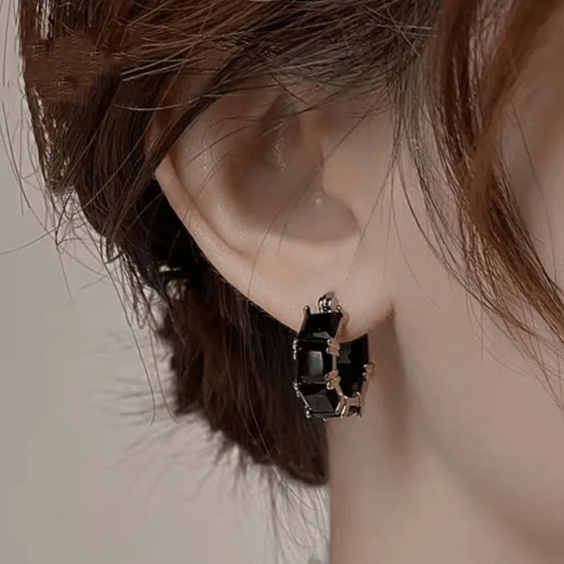 Geometric U-shaped gold earrings with round crystal zirconium stones in black, pink, or white options