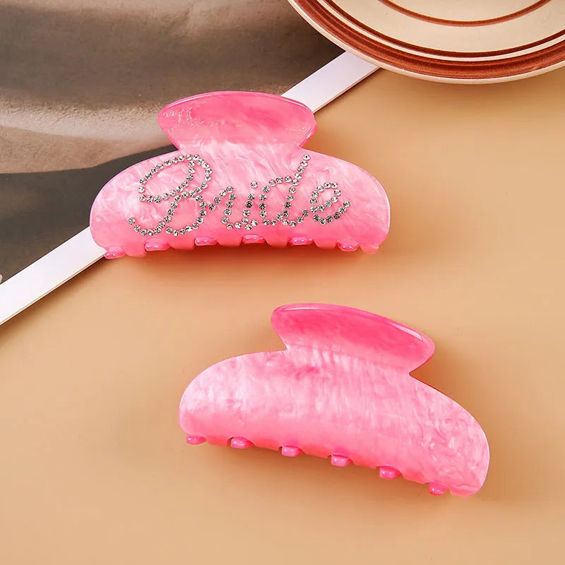 Pink and white 10cm acrylic hair barrettes with shark clip backs and diamond spot drill decoration