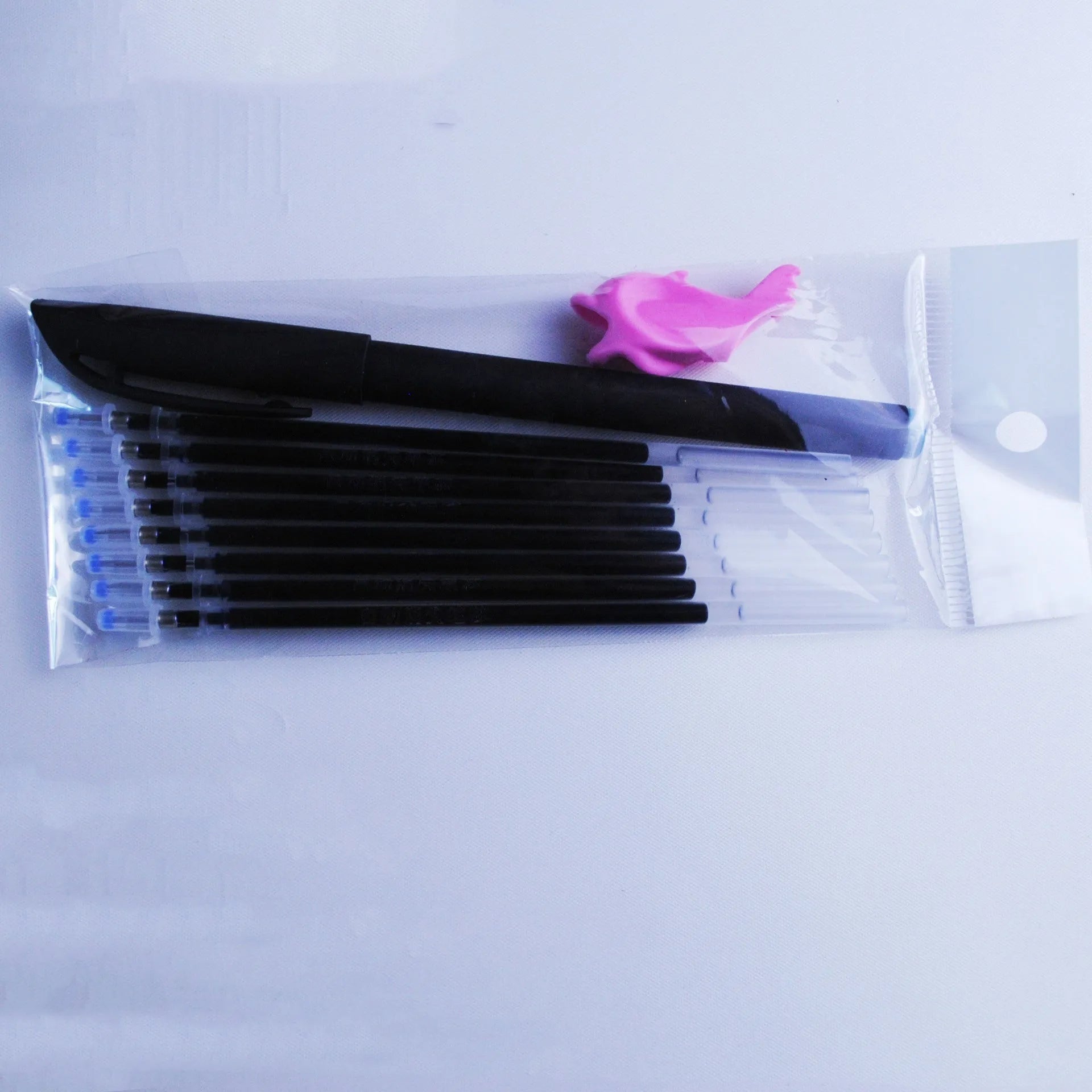 Automatic fading ink pen set with 0.5mm tip, blue refills and pen holder