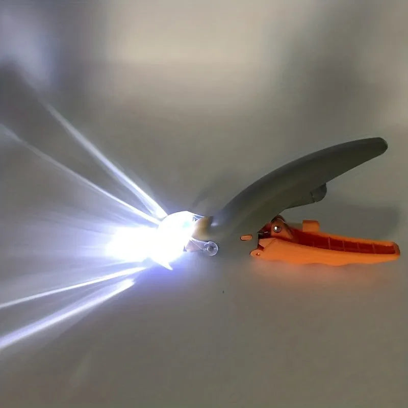 Yellow LED pet nail trimmer with magnifying glass for cats and dogs showing cutting blades and light features