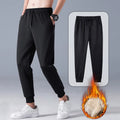 Black fleece lined straight leg trousers for men and women with drawstring waist, available in sizes M-5XL