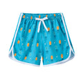 Children's polyester holiday shorts in various colours and patterns for beach wear