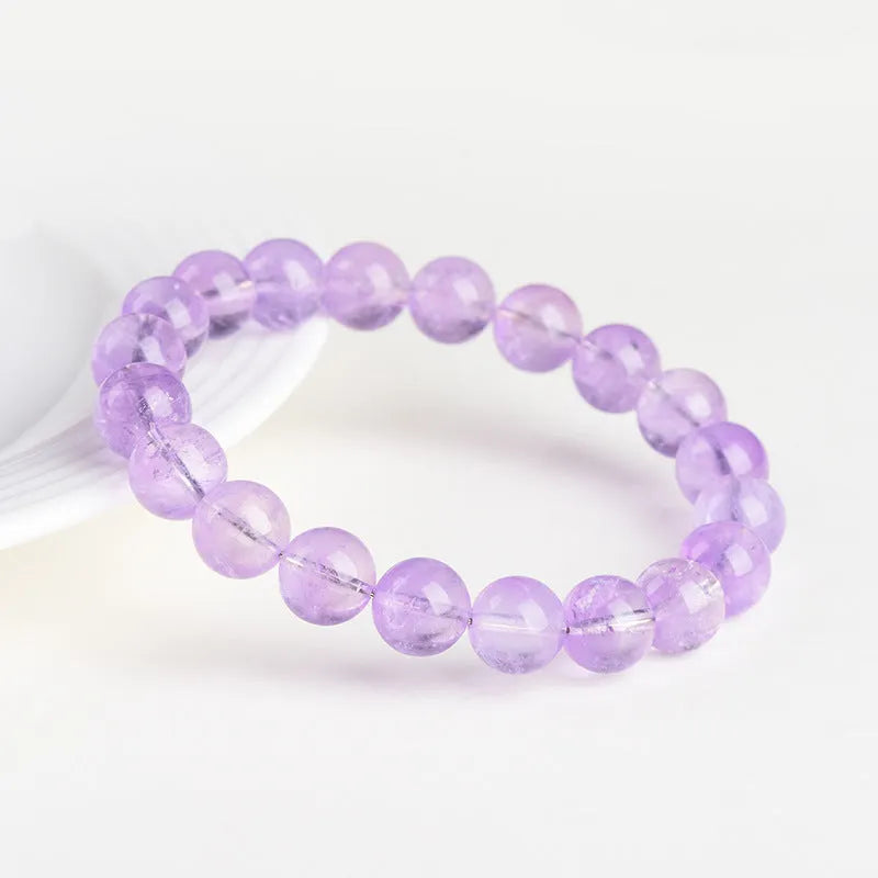 Lavender amethyst water ripple bracelet with round beads in various sizes from 6mm to 17.8mm