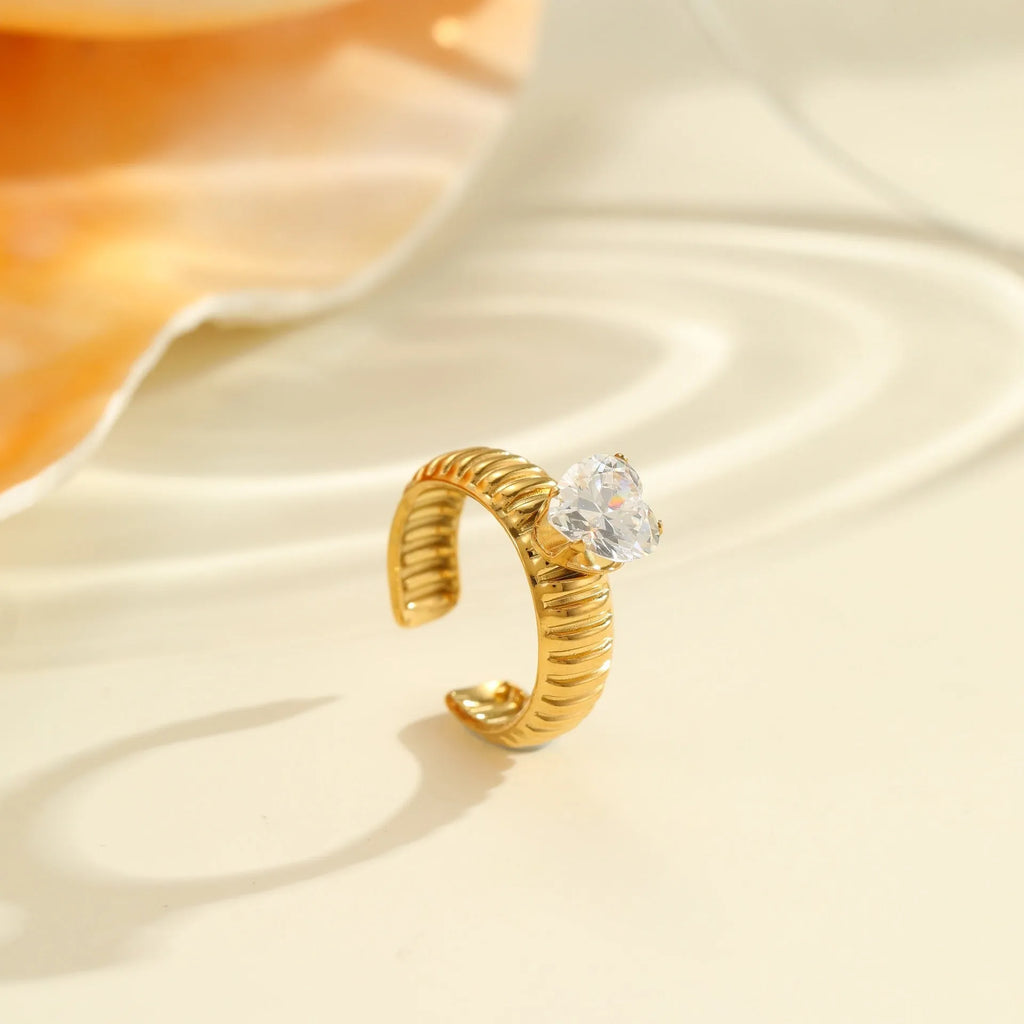 Gold electroplated stainless steel ring with zircon detailing and open mouth adjustable design