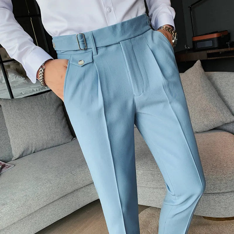 Straight-leg casual trousers in a neutral colour on a hanger, showing the simple fit and polyester fabric.
