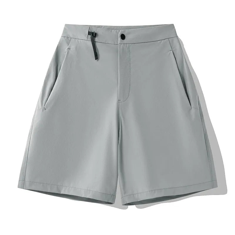 Men's quick-drying sports shorts in Army Green colour, showing 3D cut and elastic design.