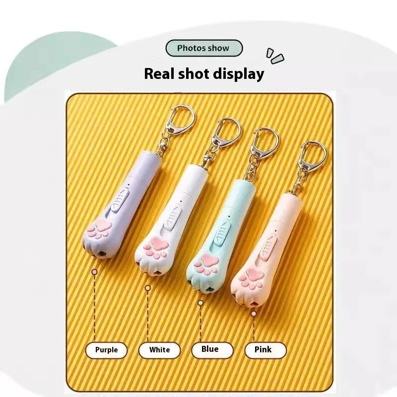 Cat pen light charging toy with teaser wand in cream white, pink or blue plastic