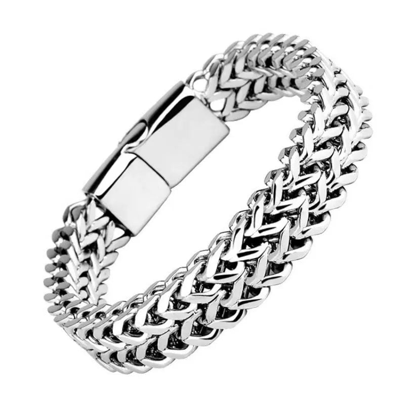 Silver stainless steel men's bracelet with geometric links, showing hip hop style on a wrist.