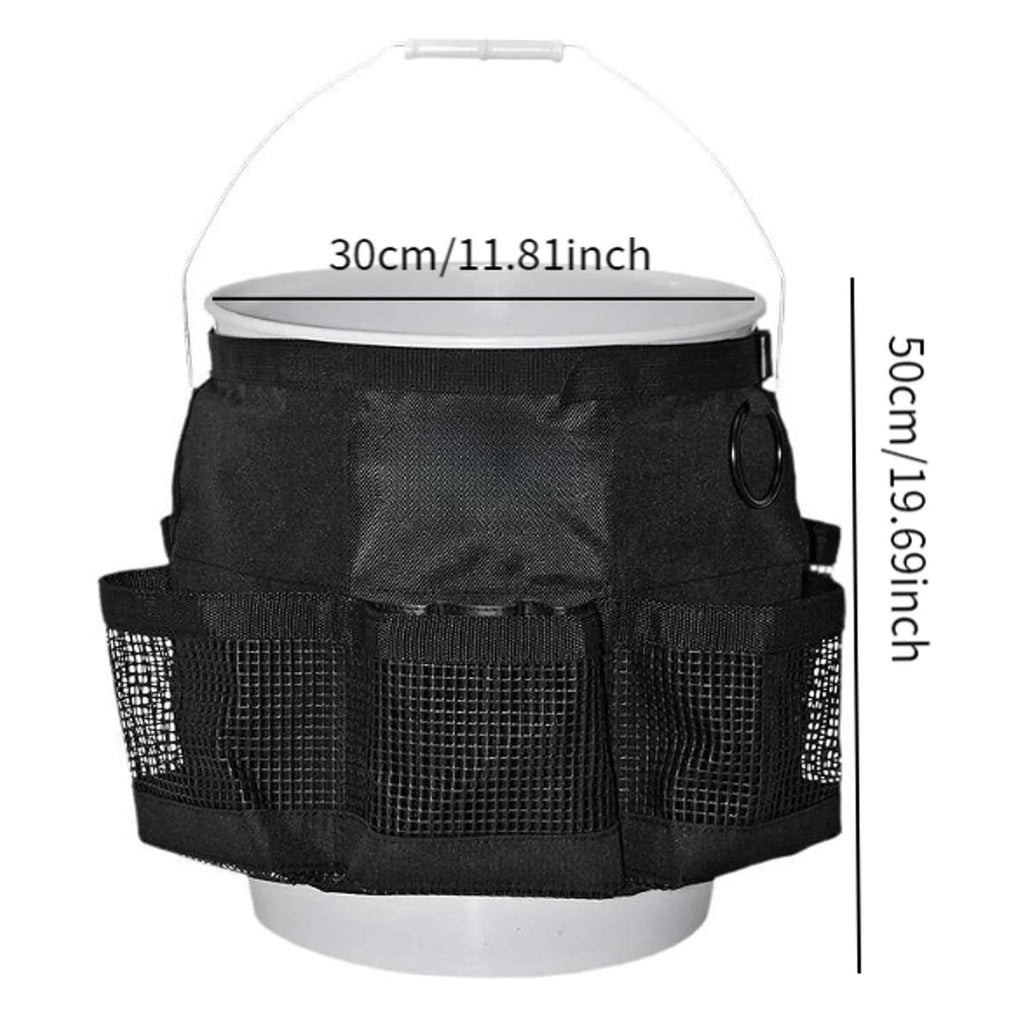 Black cylindrical polyester buggy bag hanging from a 5 gallon barrel for tool storage.