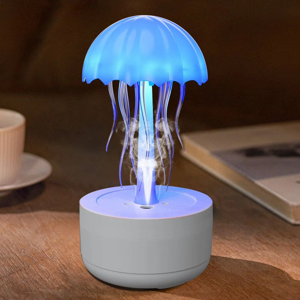 White jellyfish-shaped humidifier diffuser with colourful LED lights and visible mist output