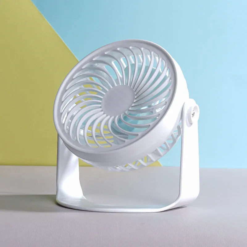 Small USB desk fan with clip attachment and floor stand options in white plastic housing
