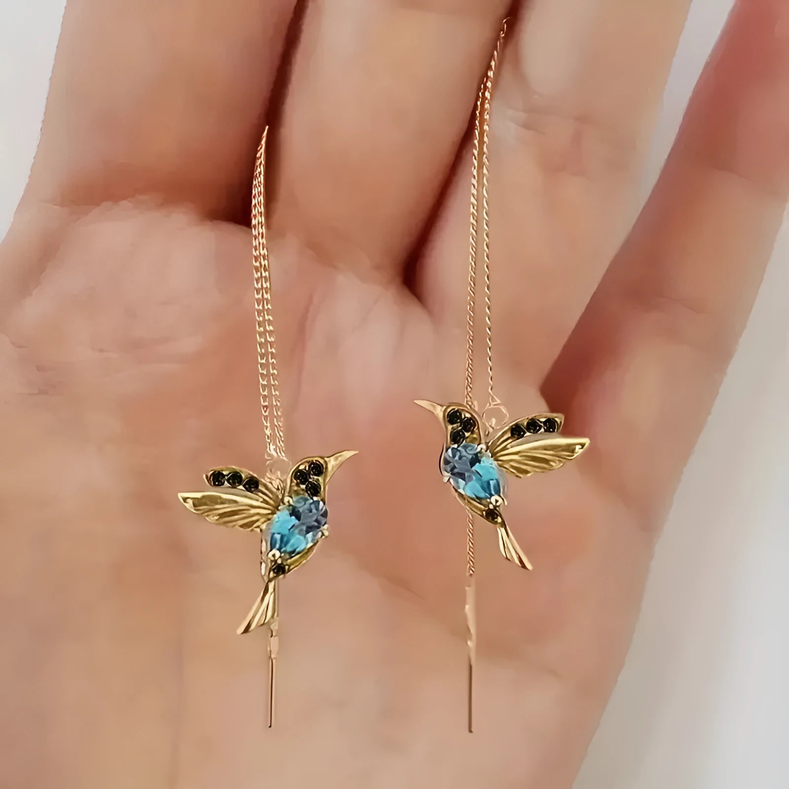 Women's personalised bird hanging long style earrings with mixed zirconium wings in three colour options