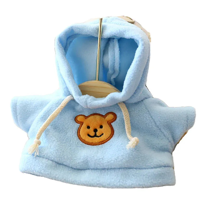 A blue cloth dog hoodie sweater for a small pet, showing the hood and front opening.