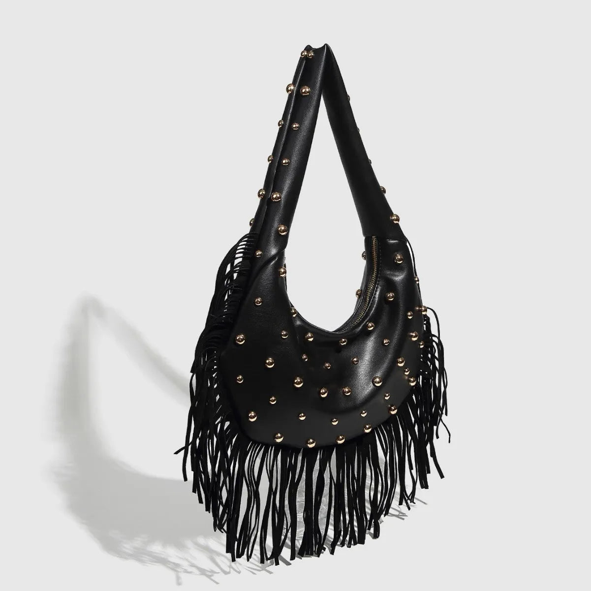 Retro tassel shoulder handbag with internal phone compartment in black or wine red colour