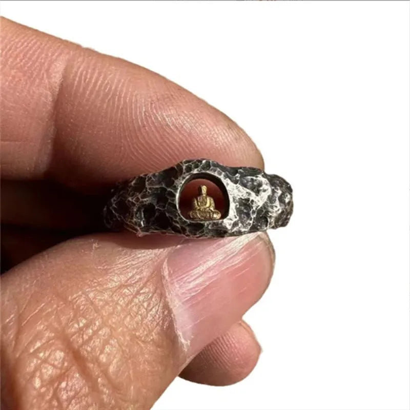 Hand-forged copper Grotto Buddha ring with rock texture on a band, shown in size No. 8.