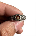 Hand-forged copper Grotto Buddha ring with rock texture on a band, shown in size No. 8.