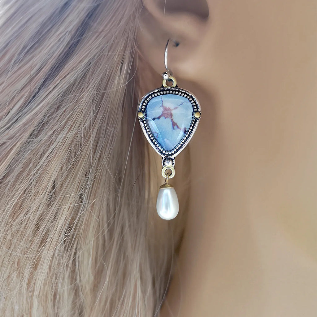 Women's lavender turquoise and white pearl drop earrings with geometric retro design.