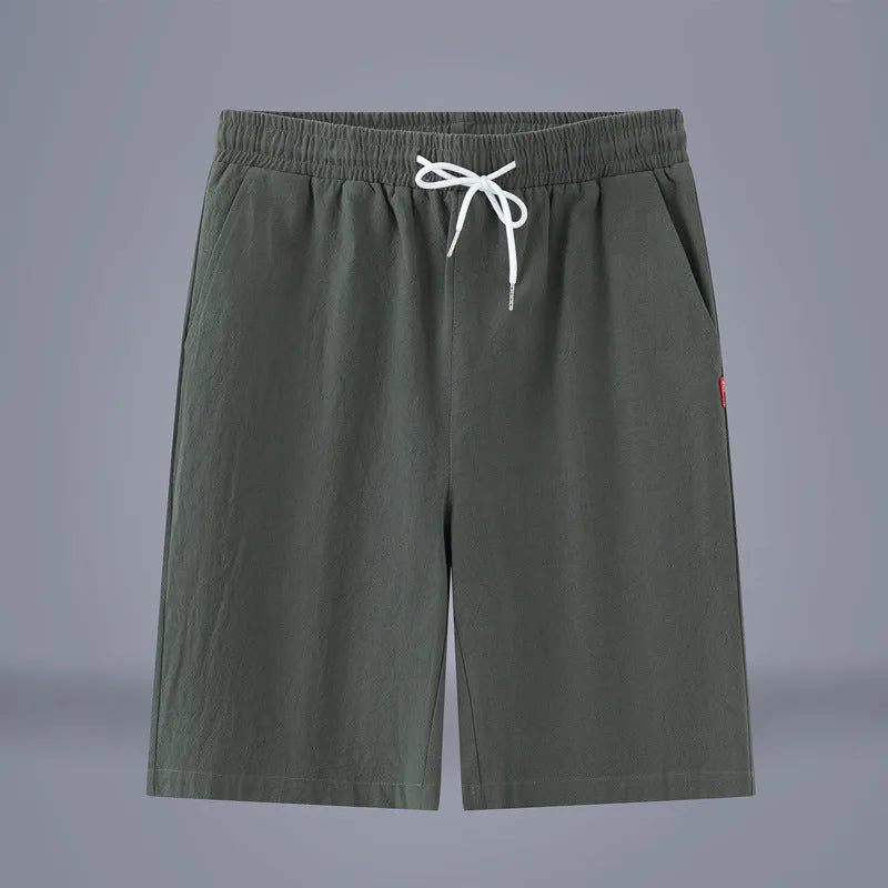 Solid colour cotton linen cropped pants with a drawstring waist on a hanger.