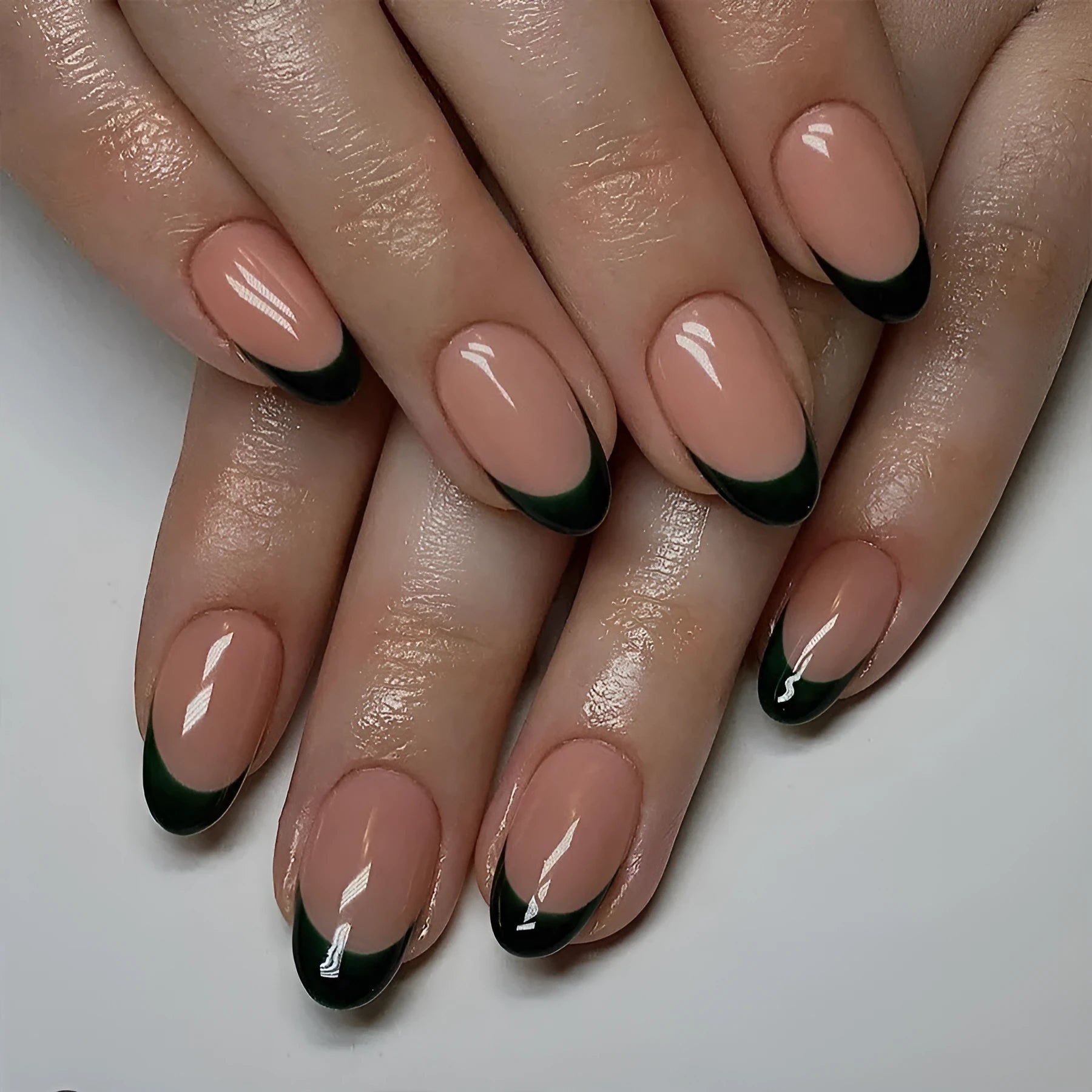 24 French style black manicure stickers in short almond shape arranged on white background