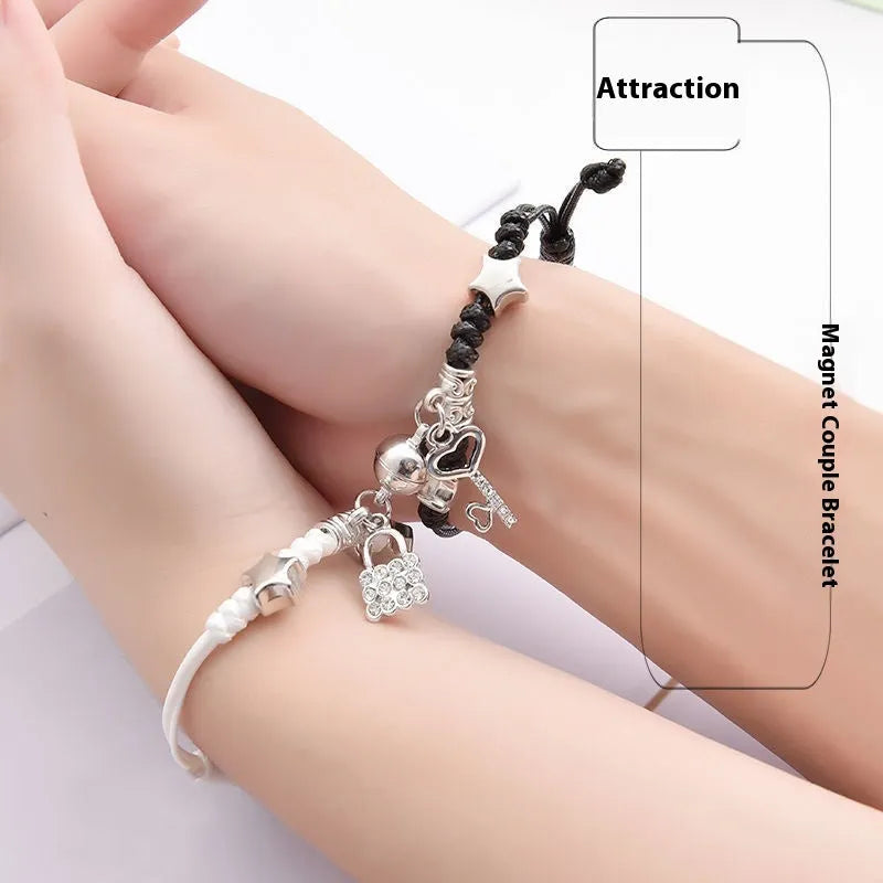 Magnetic couple bracelet pair showing crown design with electroplated alloy construction and magnetic fastening